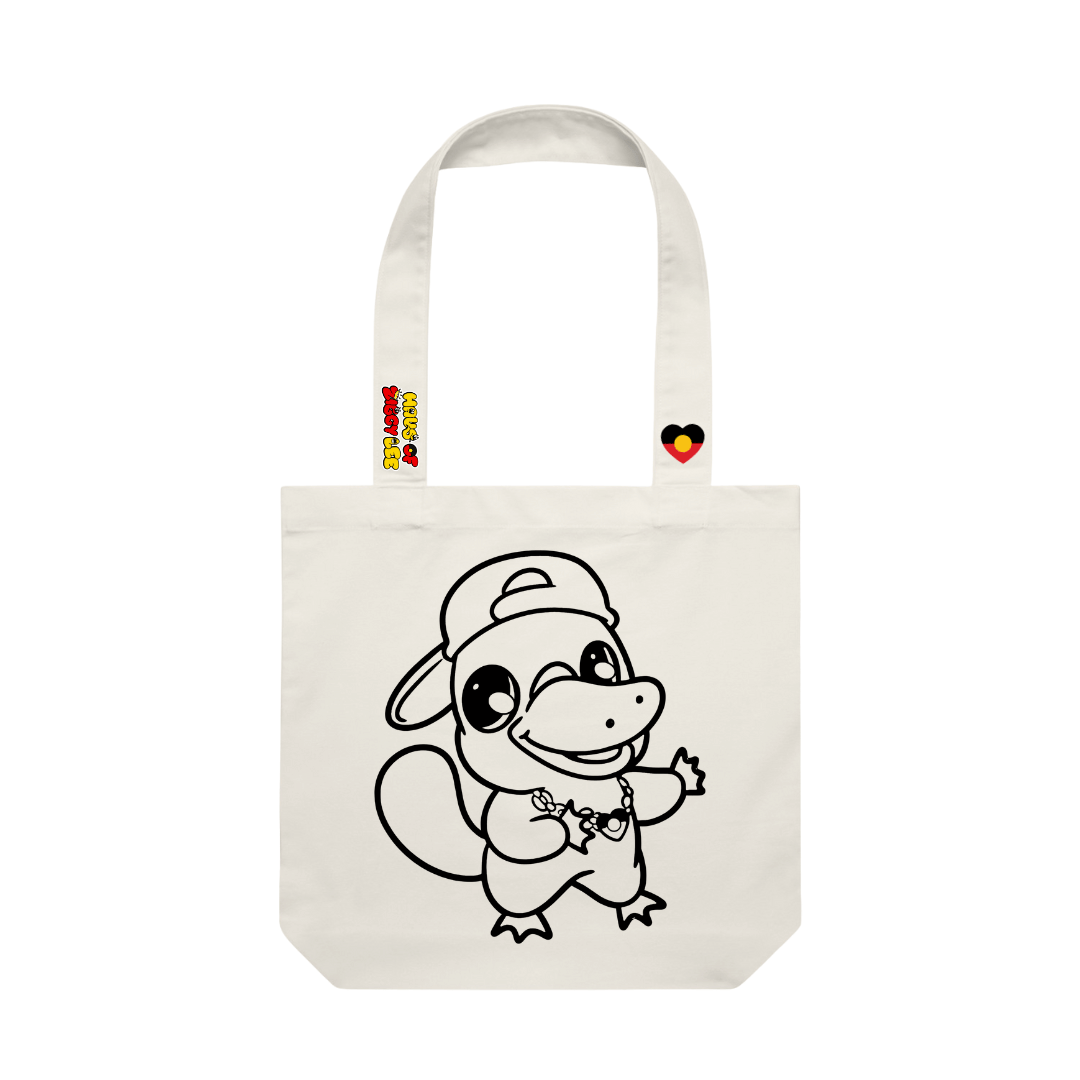 haus of ziggy lee canvas colour in tote bag with bunji cartoon platypus design black outline to fill in. haus of ziggy lee logo and aboriginal flag heart decals on strap.