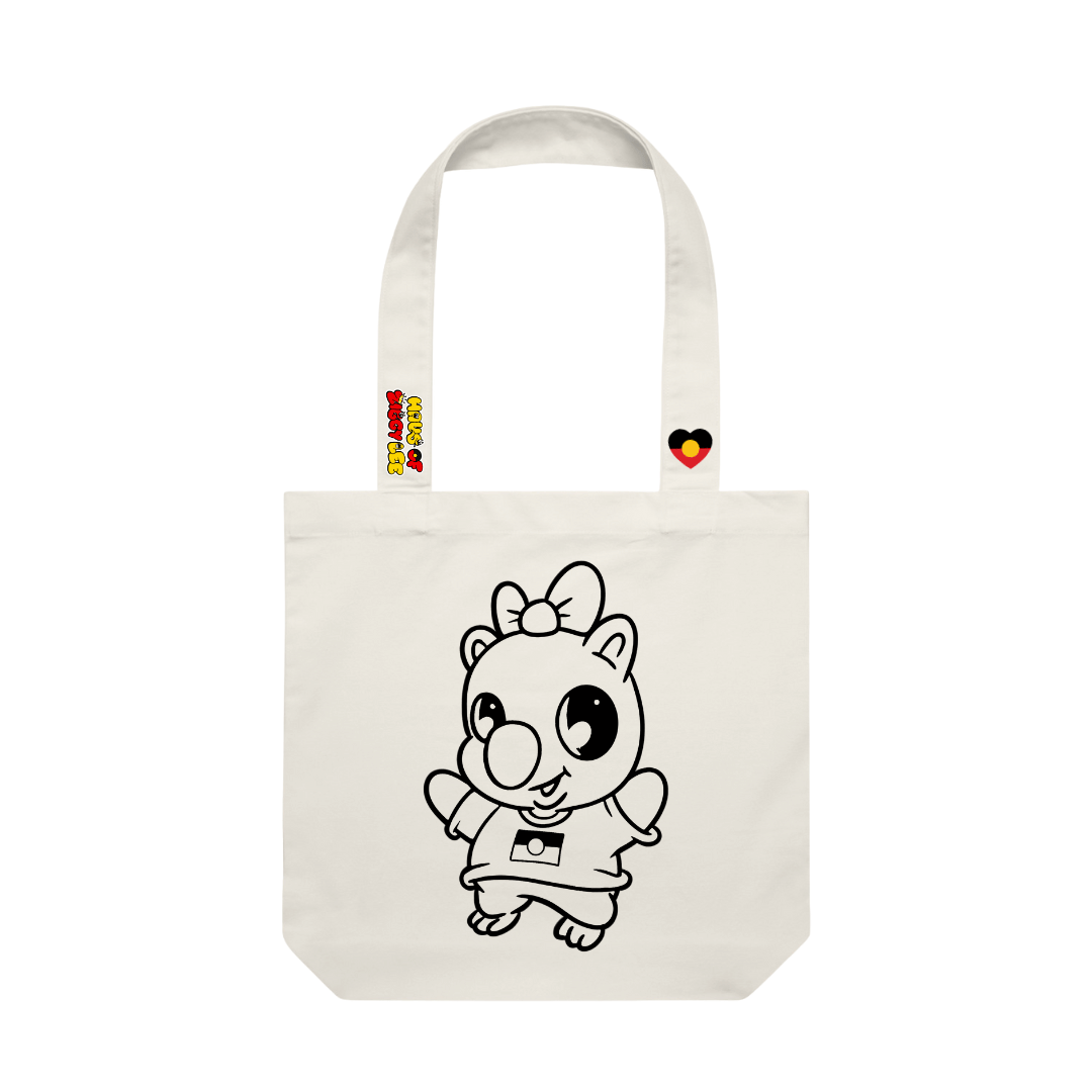 haus of ziggy lee canvas colour in tote bag with woomie cartoon wombat design black outline to fill in. haus of ziggy lee logo and aboriginal flag heart decals on strap.