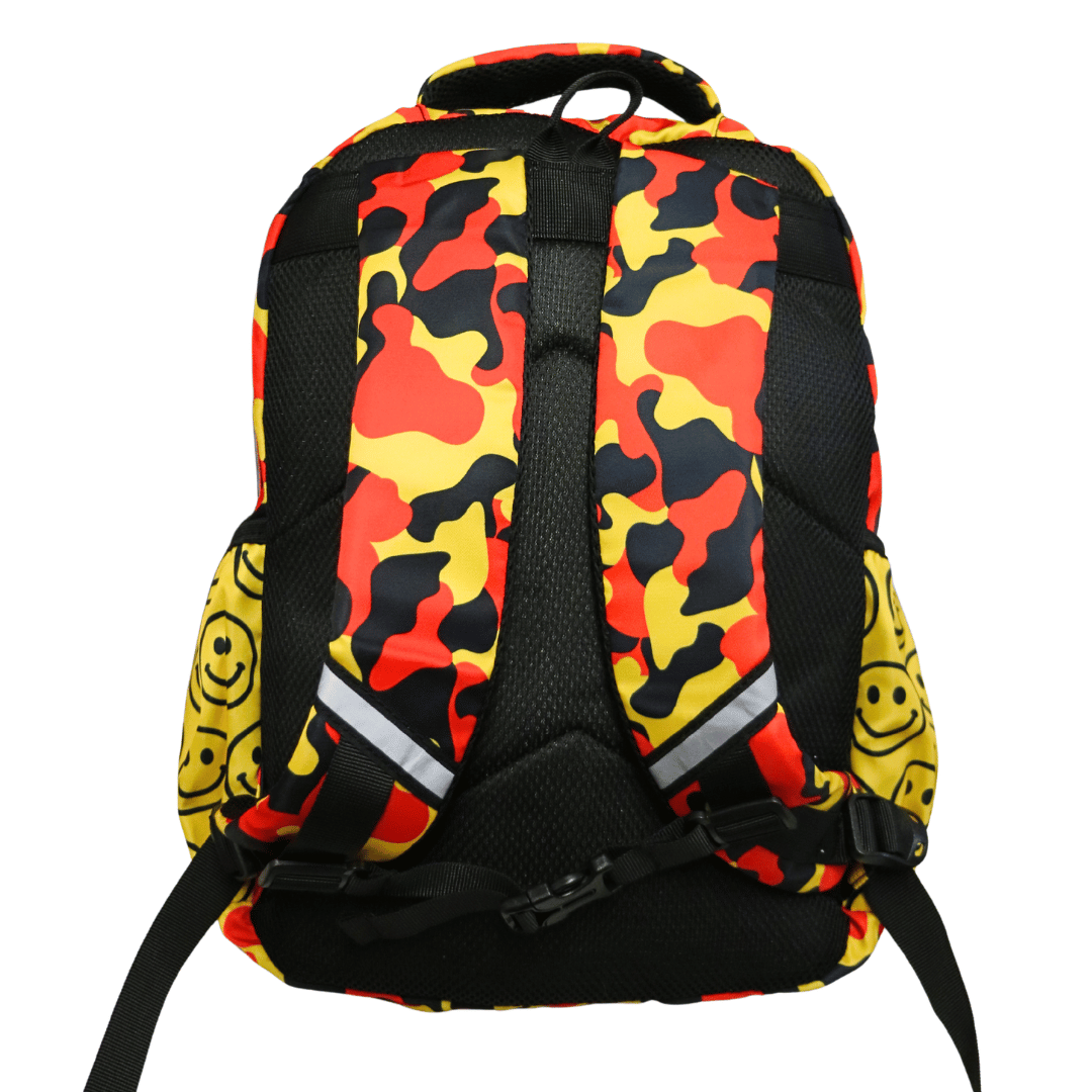 haus of ziggy lee everyday deadly backpack with a bold red, yellow, and black camouflage pattern, featuring yellow smiley face prints on the side pockets and reflective silver straps on the back. also has hiking strap and clip for weight distribution and comfort. back view