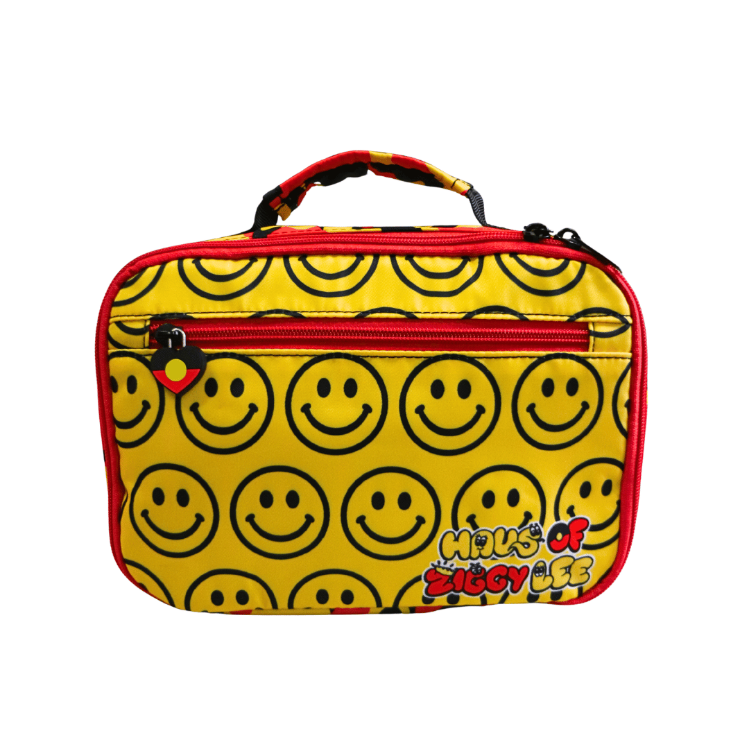 A yellow lunch bag with a repeating black smiley face pattern, red trim, a top handle, and a front zip pocket. The bottom right corner features the 'Haus of Ziggy Lee' logo