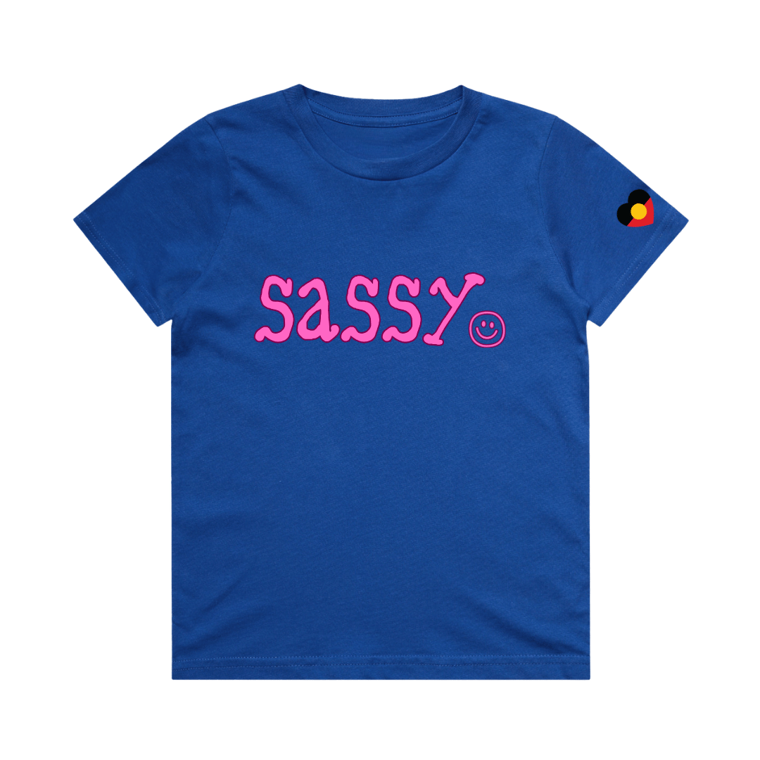 haus of ziggy lee blue t-shirt with pink 'SASSY' text and smiley face and Aboriginal heart flag decal on sleeve